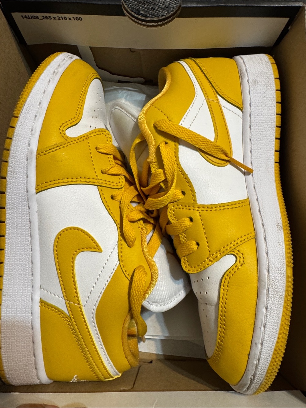 Jordan Black and Gold Low-Top Sneakers Box